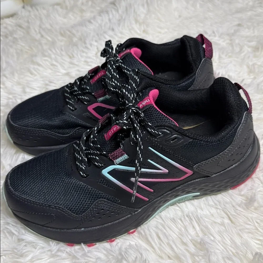 New Balance Black Sneakers with Pink Highlights